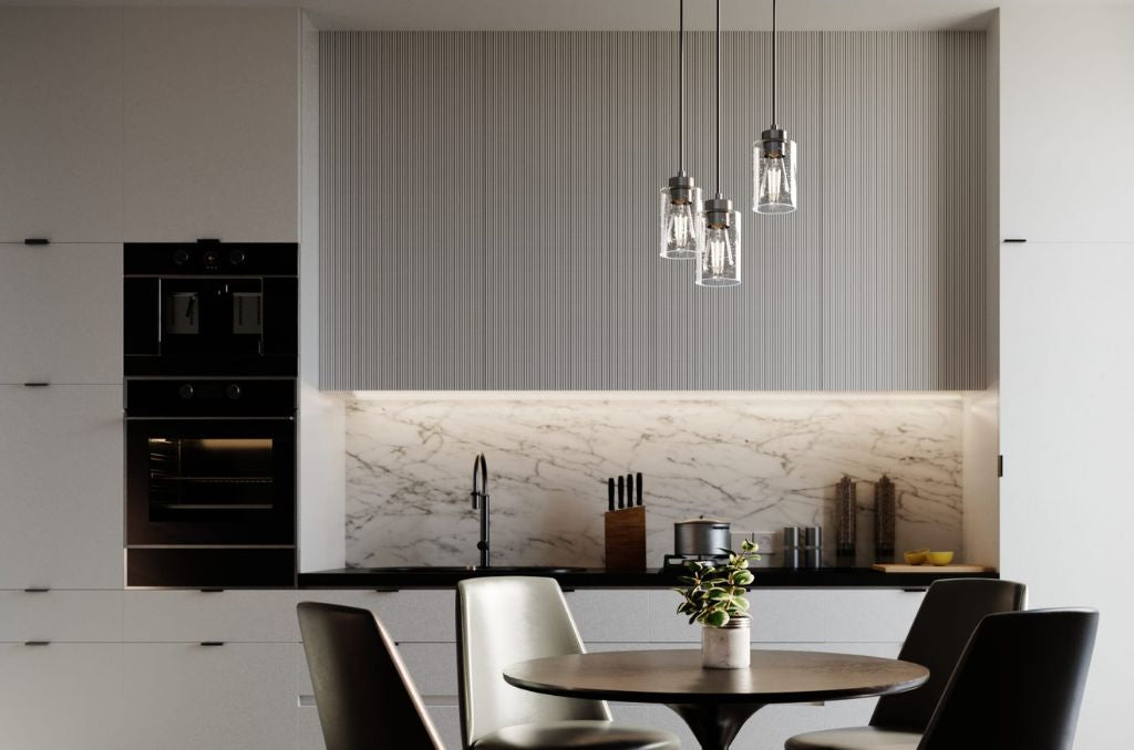 Hartland cluster lighting in brushed nickel finish over kitchen table.