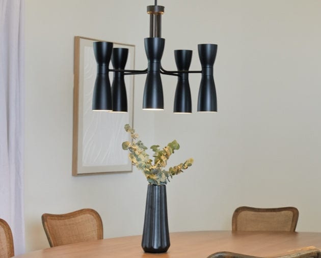 Dining room with modern chandelier.